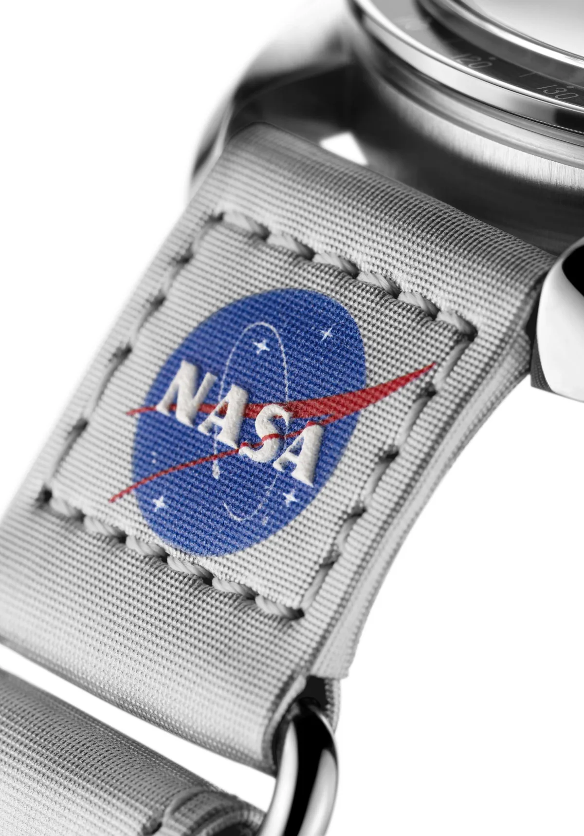 Close-up of Omega Speedmaster with Velcro strap in space