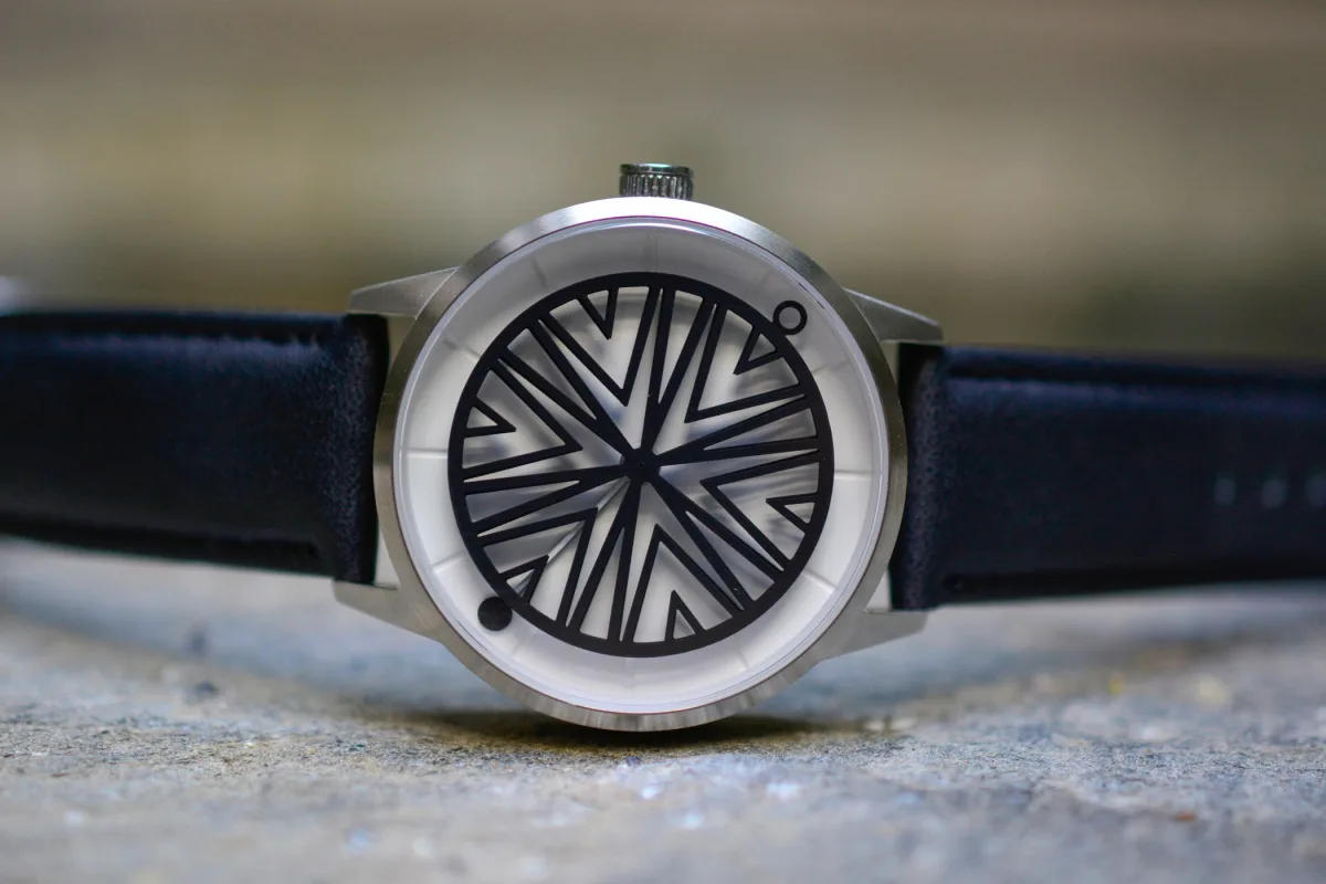 Humism Rhizome watch model close-up with kinetic art dial