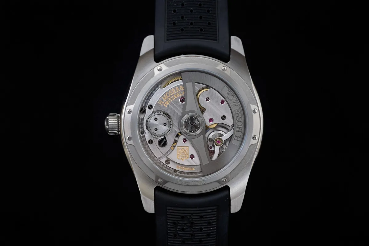 Side view of H. Moser & Cie. Pioneer Centre Seconds case showing polished and matte finishes