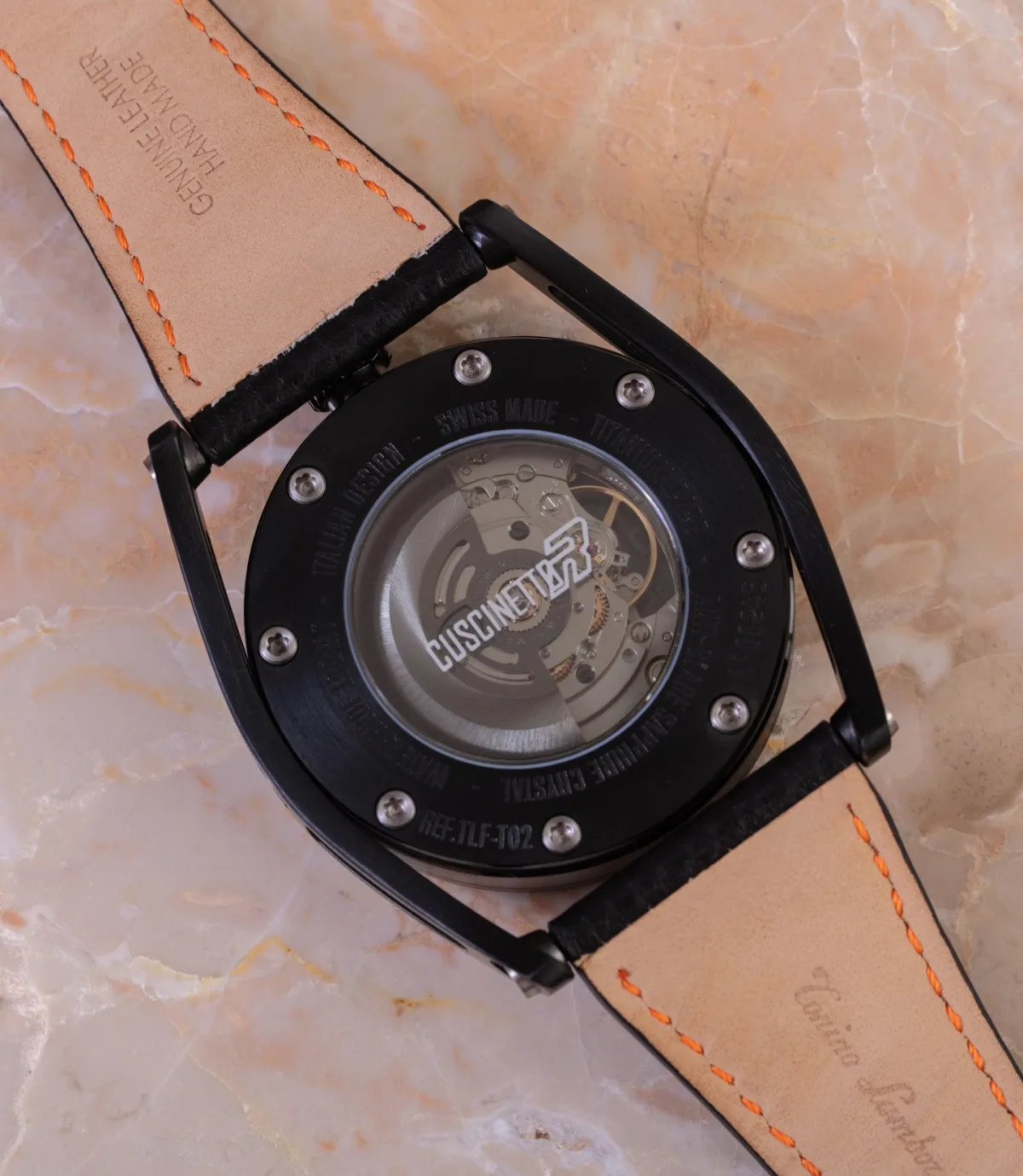 Close-up of the Cuscinetto R's dial with smoky color and Arabic numerals