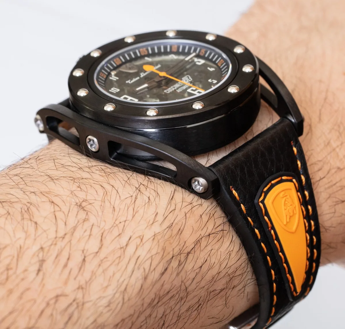 Cuscinetto R watch strap with bright orange rubber insert