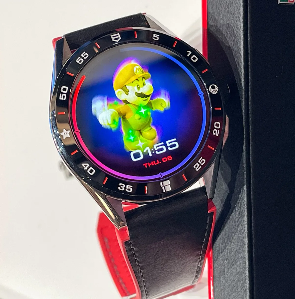 Close-up of the Super Mario-themed bezel
