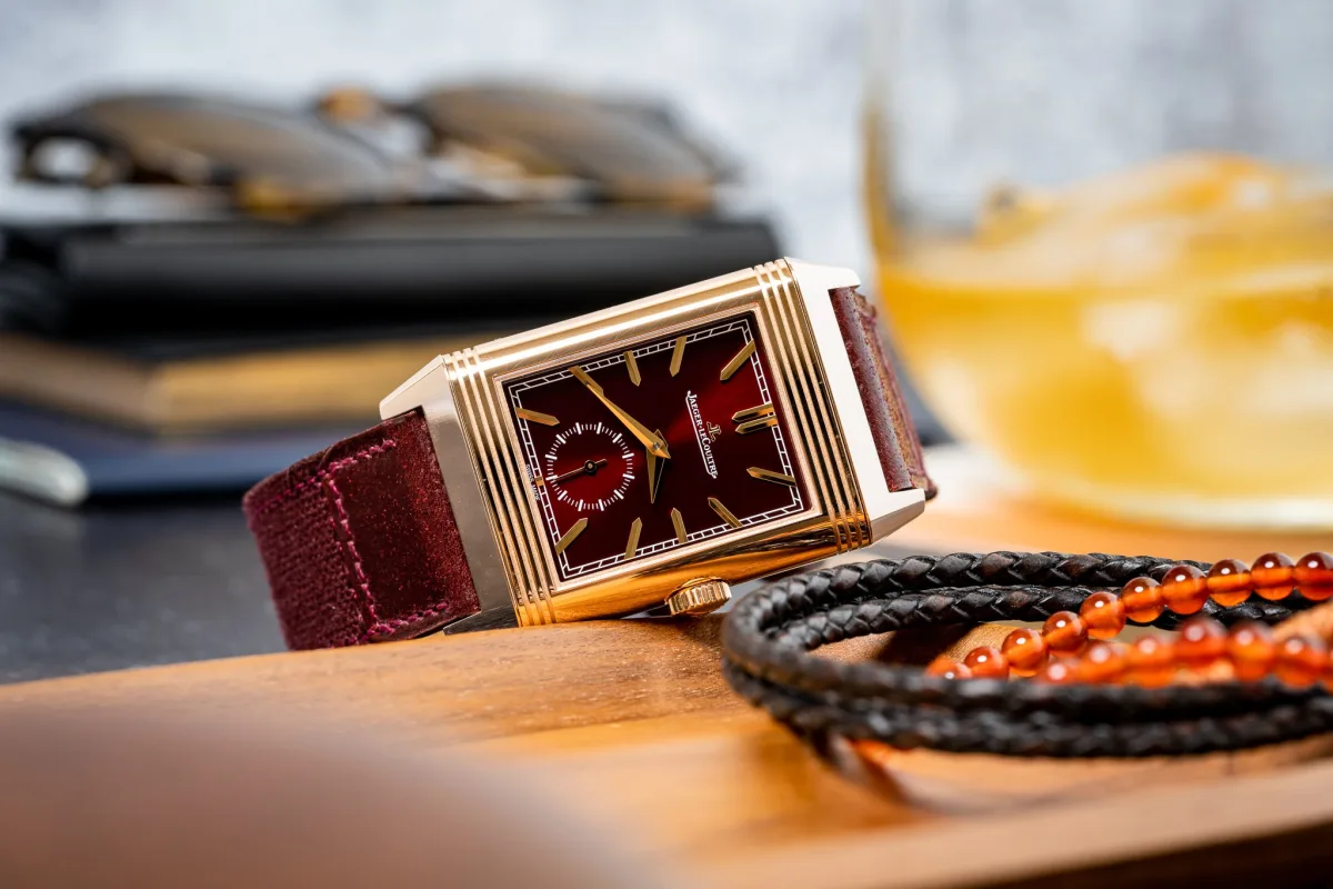 Jaeger-LeCoultre Reverso with red sunburst dial and burgundy leather strap