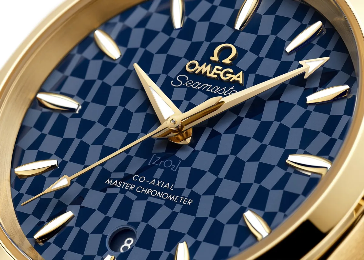 Close-up of the Olympic emblem on the watch caseback