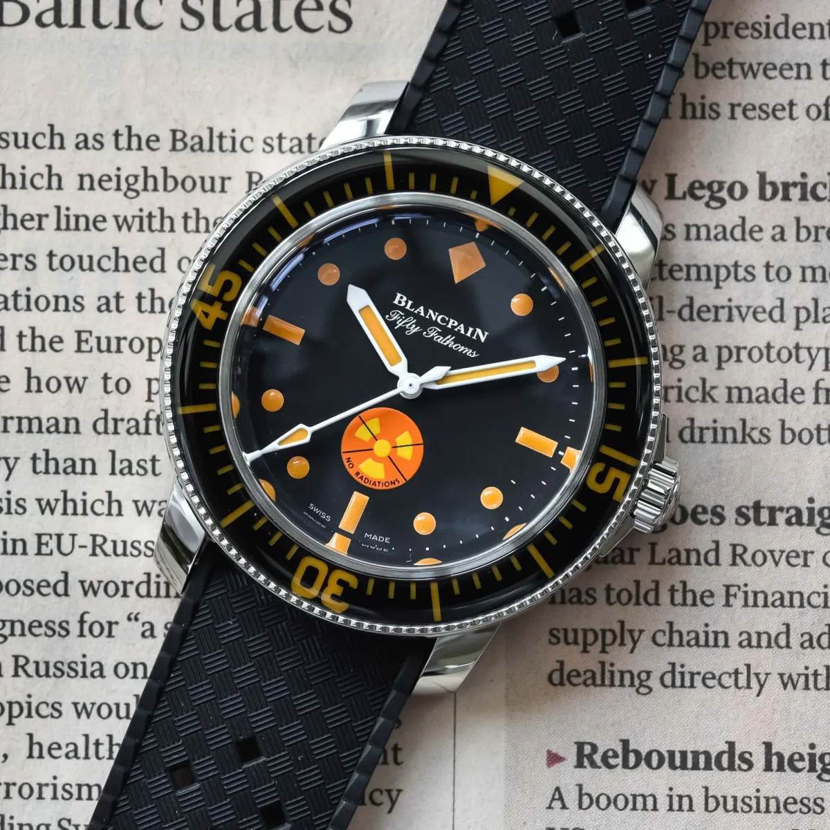 Dial of Blancpain Tribute to Fifty Fathoms No Rad with orange markers