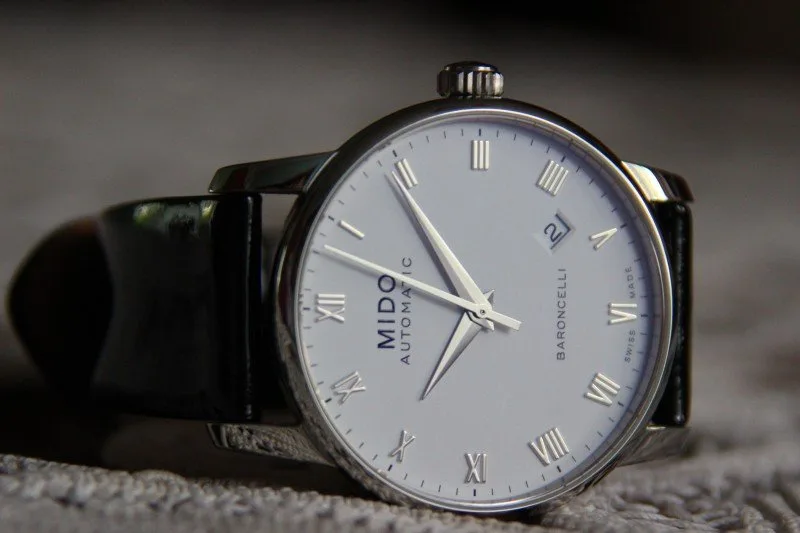 Mido Baroncelli M86004268 watch with white dial and brown strap