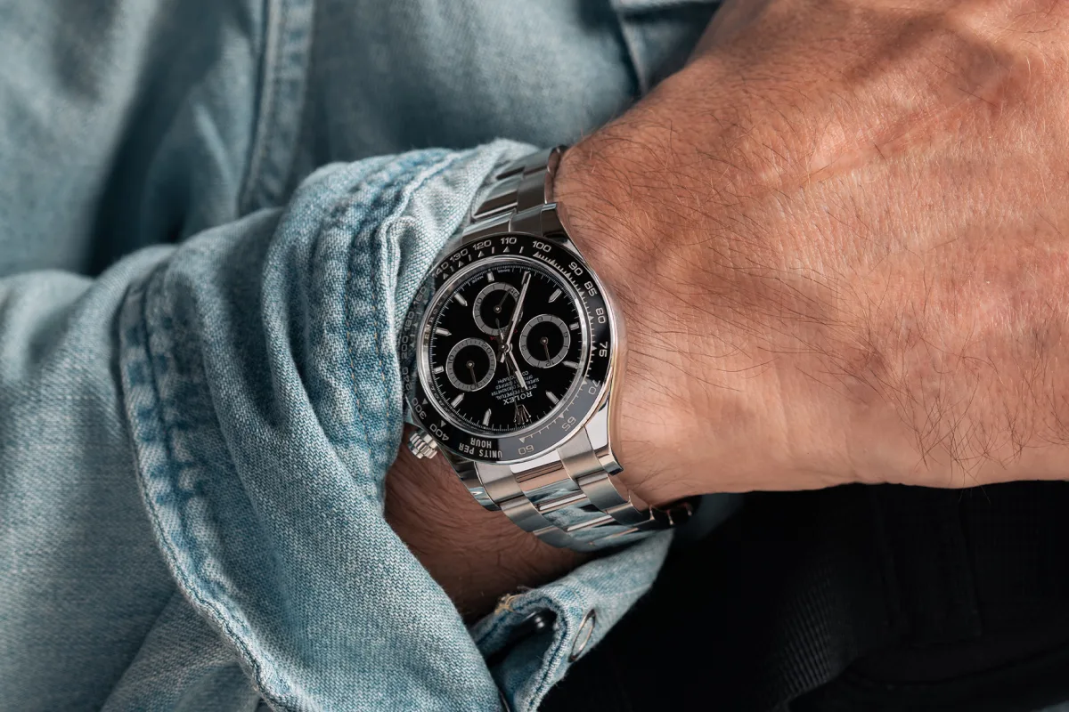 A crowded watch display at a trade show.