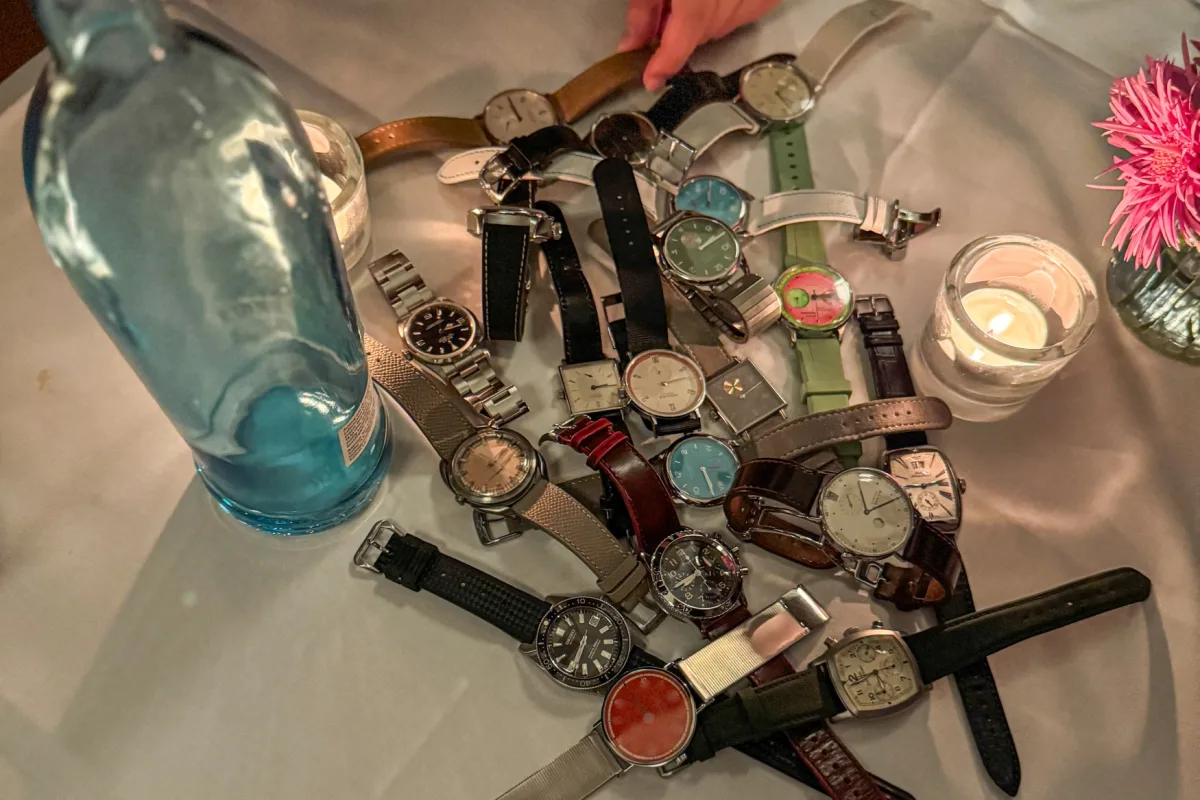Rolex retail store with various watch models displayed.