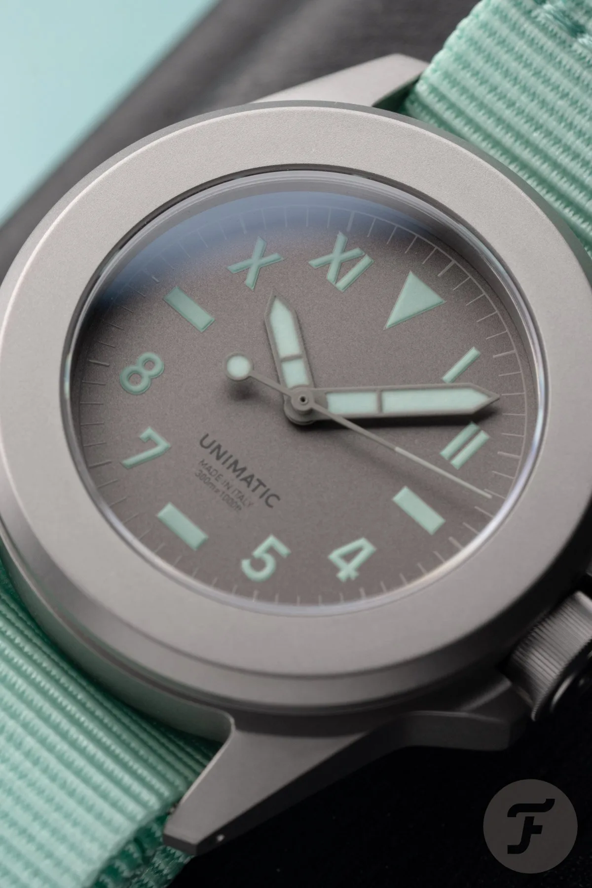 Close-up of titanium case of Unimatic Modello Quattro U4S-T-LB