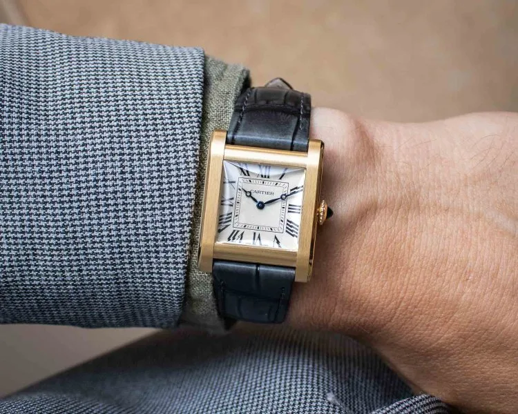 Close-up of Cartier Tank Normale hands