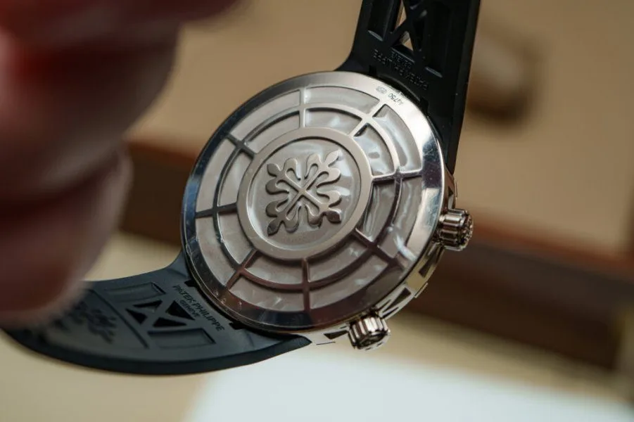 Solid case back of Patek Philippe 6105G with Calatrava cross