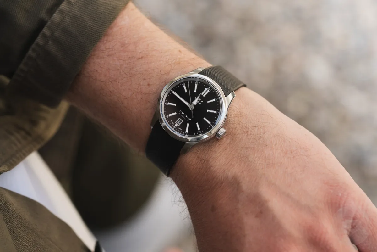 Wrist shot of Christopher Ward C63 Sealander Automatic on rubber strap.