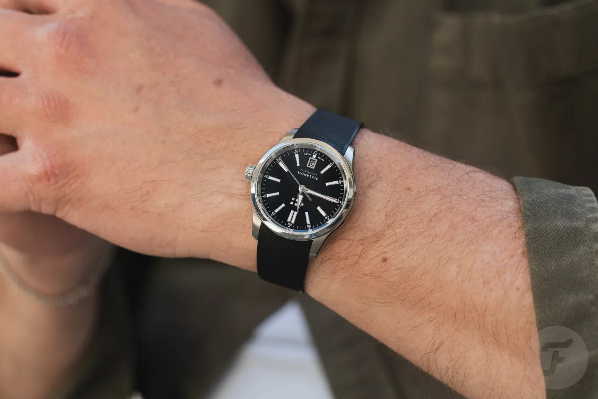 White dial with black details on Christopher Ward C63 Sealander GMT.